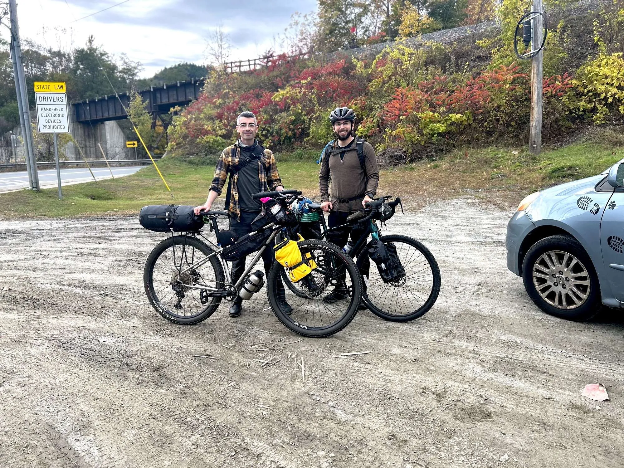 Asher and me with our bikes in the parking lot before rolling out