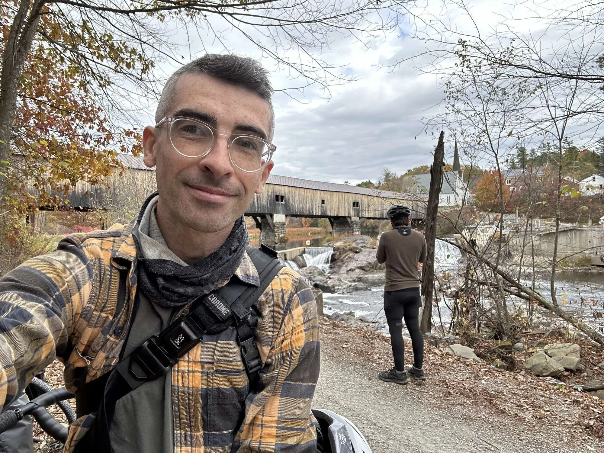Selfie by a covered bridge