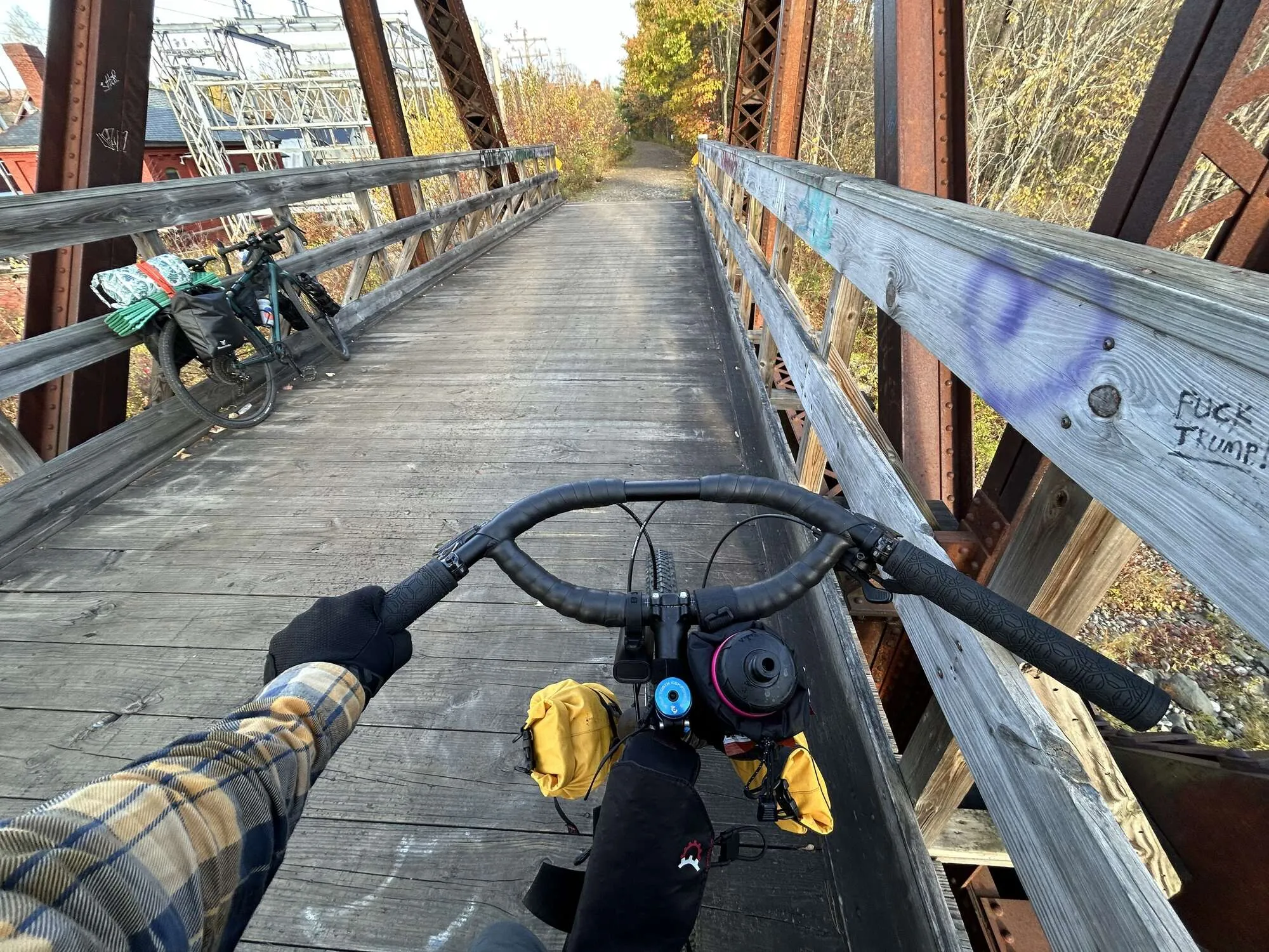 Point of view on a wooden pedestrian bridge